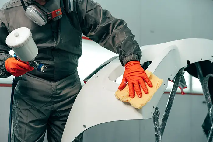 Auto mechanic worker wearing protective workwear