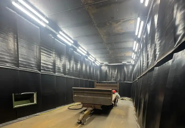 Trailer inside the blast room