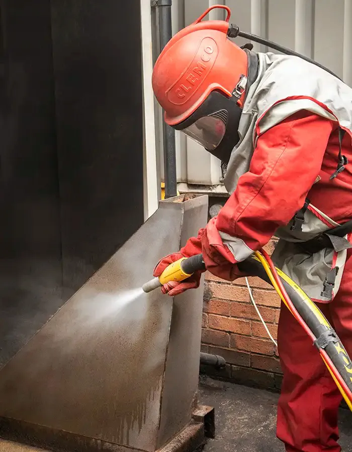 Abrasive blasting in action Abrasive blasting in action
